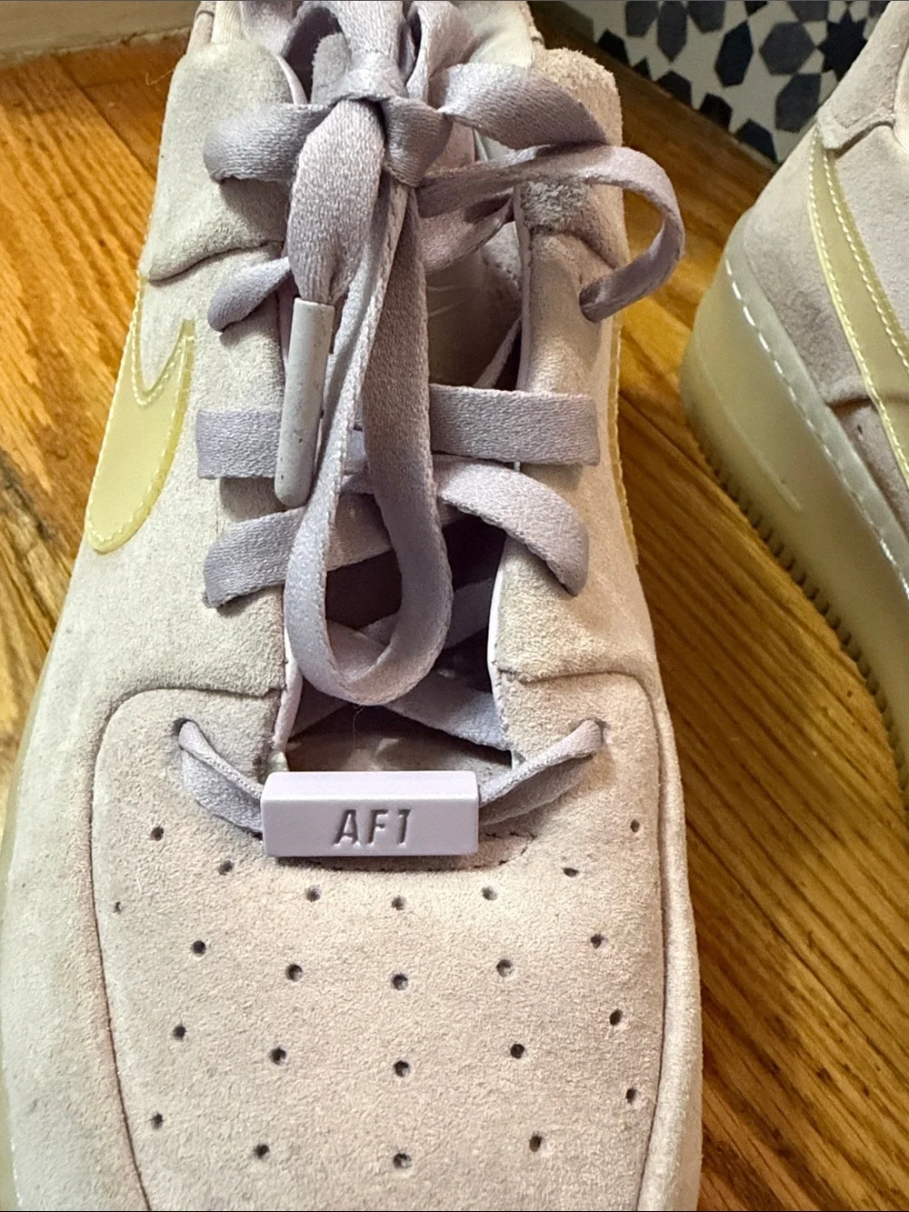 Nike Women’s Lavender Suede Platform Sneakers with Cream Swoosh